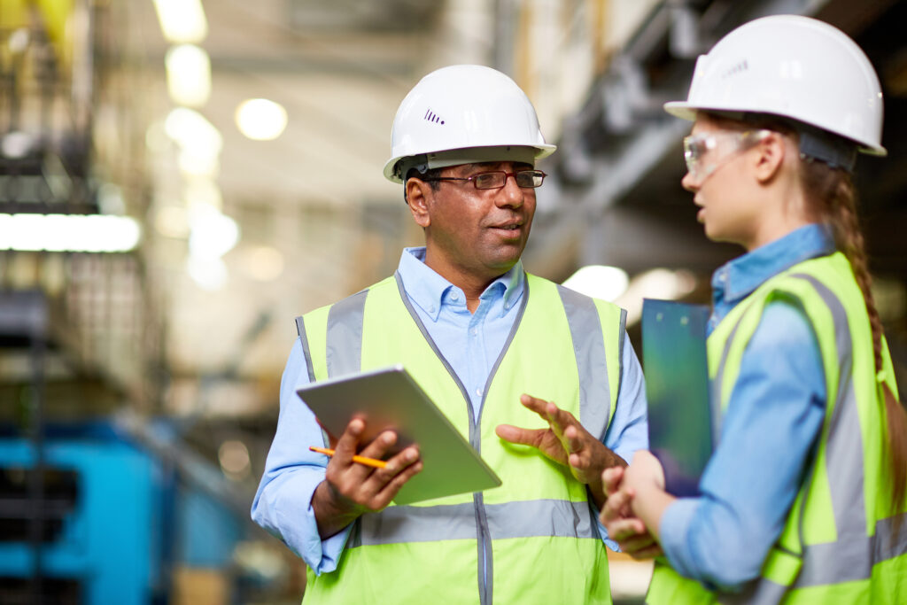 WHS consultant reviewing safety compliance inside a Gold Coast facility
